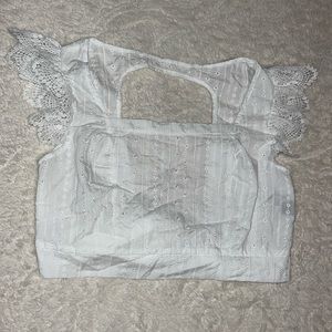 White frilly open back crop top